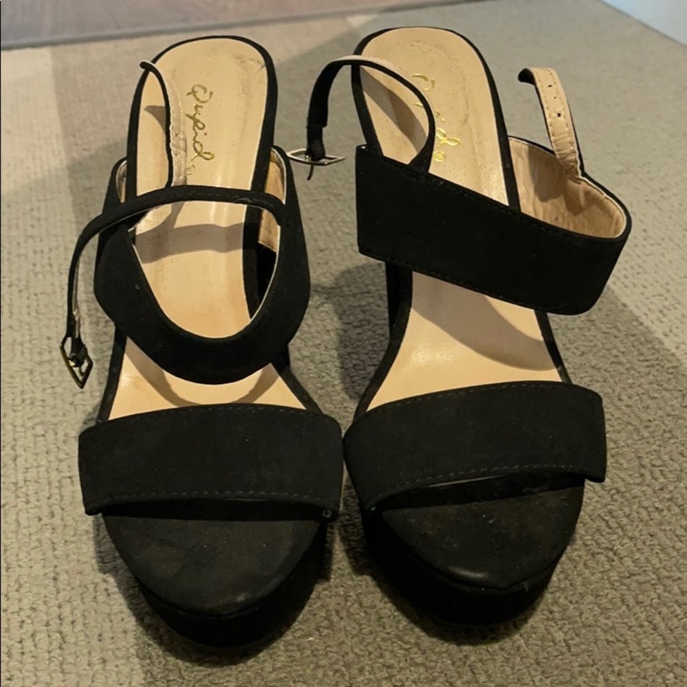 high heeled black sandals